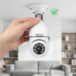 Ръка, завинтваща бяла смарт WiFi камера FipTec под формата на крушка в стандартна фасунга E27 на тавана в хол. Осигурете си надеждна охрана и интелигентна сигурност за вашето пълно спокойствие чрез изключително лесен монтаж без нужда от допълнително окабеляване.